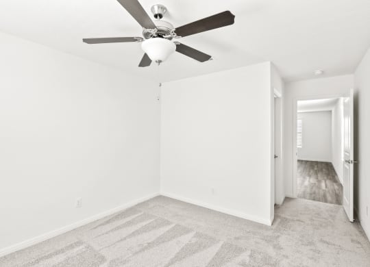 Sycamore bedroom with a ceiling fan at Beacon at Ashley River Landing in Summerville, SC