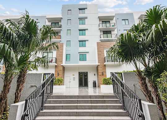 Steps leading to entryway in our midrise apartment community at Twenty2 West luxury apartments in Miami, FL