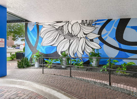 Colorful mural in the entrance area at The Grand at Upper Kirby apartments in Houston, TX