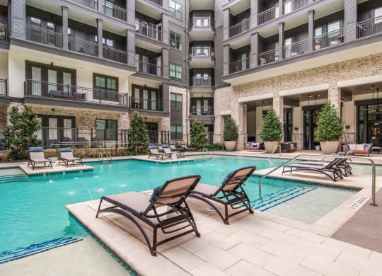 Poolside Seating at The Alastair at Aria Village Apartment Homes in Sandy Springs, Georgia, GA