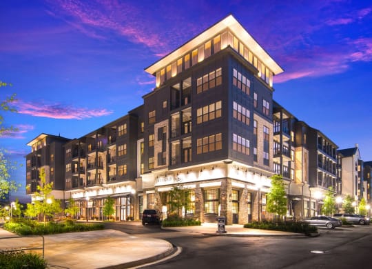 Leasing Office Exterior at Night at The Alastair at Aria Village Apartment Homes in Sandy Springs, Georgia, GA