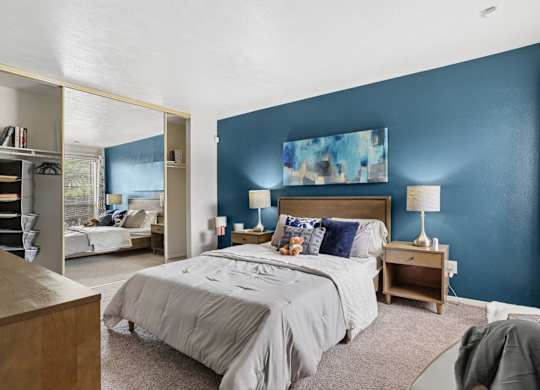 Model unit bedroom at The Summit in Mesquite, TX