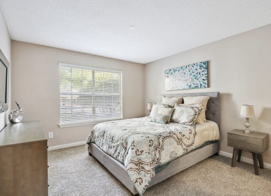 A Bedroom with a bed and a window at Wellington Ridge in Lawrenceville, GA