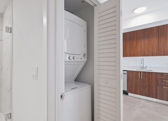 a laundry room with a washer and dryer