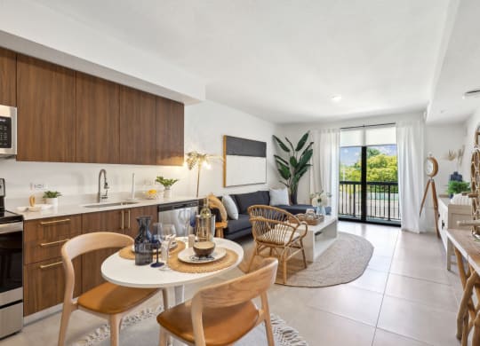 Kitchen and Living Room in A1 Floor Plan at Westgate on University in Lauderhill, FL