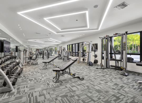 Resident Fitness Center featuring Hi-Tech Cardio Gear & Free Weights at Westgate on University in Lauderhill, FL