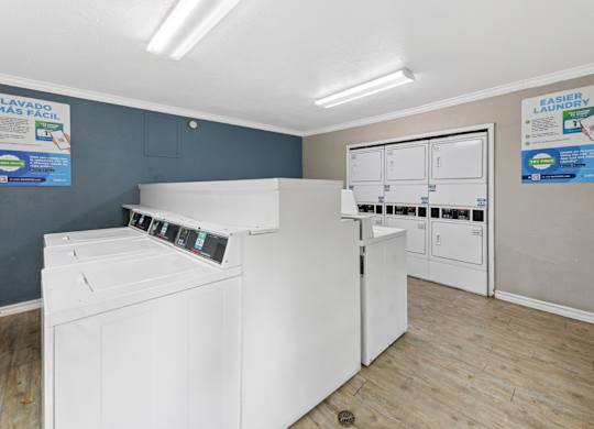 laundry center with washers and dryers at Westdale Pointe in Austin, TX