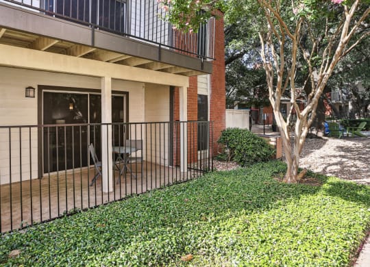 Model apartment patio with space for outdoor furniture at Hunters Chase in Austin, TX