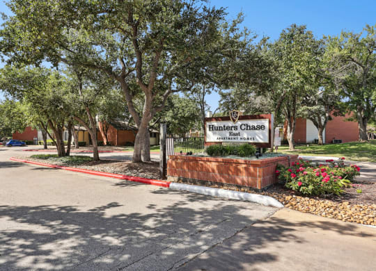 Property signage at the entrance area at Hunters Chase in Austin, TX
