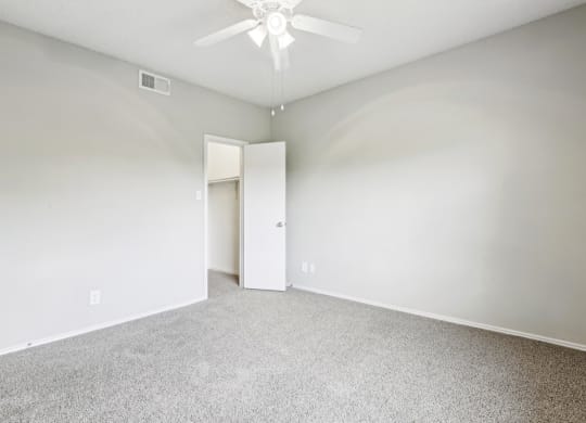 A2 floor plan bedroom with ceiling fan at Jefferson Creek Apartments in Irving, TX.