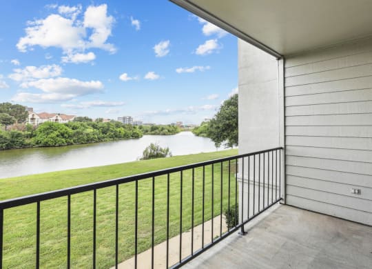 B1 floor plan balcony overlooking Hackberry Creek at Jefferson Creek Apartments in Irving, TX.