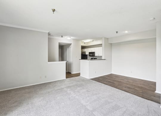 B1 floor plan living room and kitchen at Jefferson Creek Apartments in Irving, TX.
