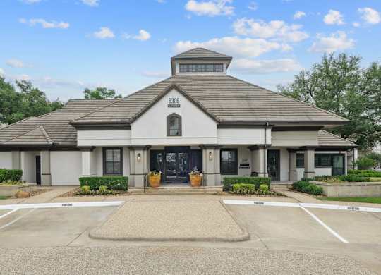 Exterior view of the leasing office for Jefferson Place apartments in Irving, TX