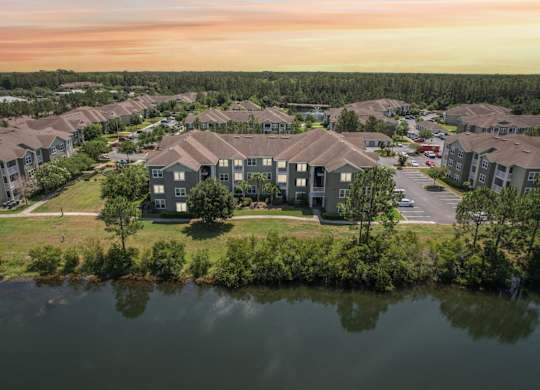 A bird's eye view of  Oakleaf Plantation apartments at dusk