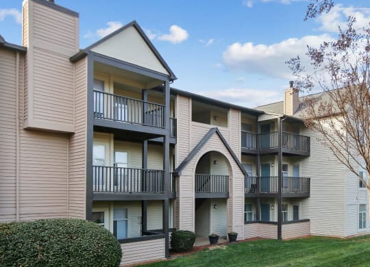 exterior view 
of Sabal Point Apartments in Pineville, NC