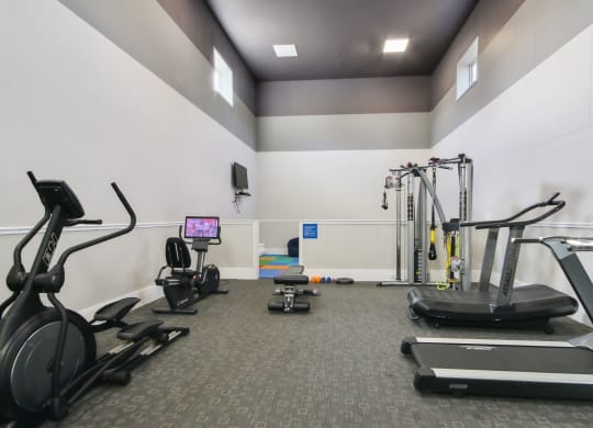 a gym 
at Sabal Point Apartments in Pineville, NC