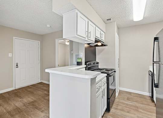 A Unit kitchen at Hollows in San Antonio, TX