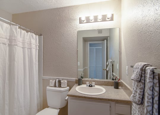 Model Bathroomat Woodmere Trace Apartments in Duluth, Georgia, GA 30096