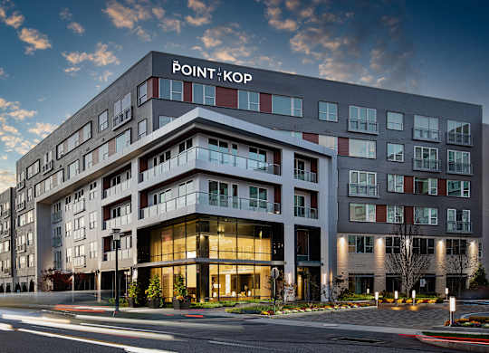 A modern building with the name "POINT KOP" on the top.