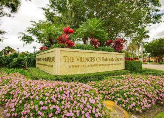 Entrance sign at The VillagesApartment  of Banyan Grove Apartments in Boynton Beach FL