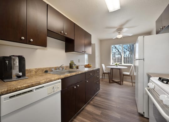 our apartments have a kitchen and living room with a large window