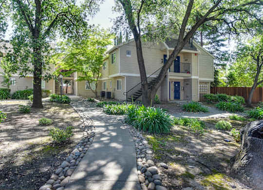 Exterior Walkways with Trees  at Hidden Oaks Apartments, California