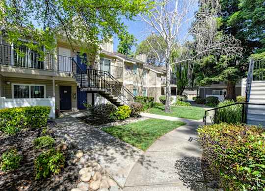 Exterior Walkways with View of Private Patios at Hidden Oaks Apartments, Citrus Heights
