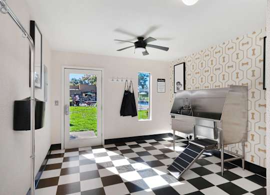 A black and white checkered floor in a room with a fan and a refrigerator at Fountains of Fair Oaks, Fair Oaks