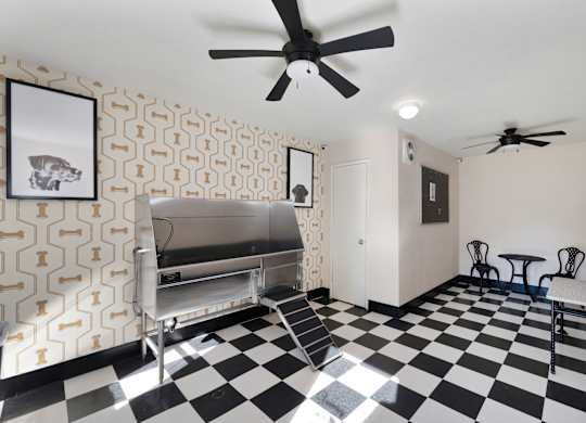 A black and white checkered floor in a room with a fan at Fountains of Fair Oaks, Fair Oaks