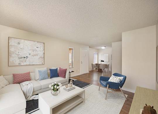a living room with a white couch and a coffee table at Fountains of Fair Oaks, California