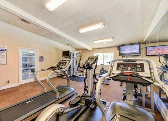 Fitness Center with Treadmills, Tv and Vending Machine.at The Renaissance Apartments, Citrus Heights, CA 95610