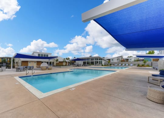 Pool with Lounge Chairs, Blue Skies with Clouds at Addison Ranch Apartments, Petaluma, 94954