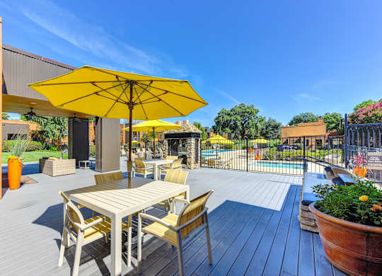 Pool Lounge  Area with Yellow Umbrellas, Grills, Gates with View of Pool at Fountains of Fair Oaks, Fair Oaks, CA 95628