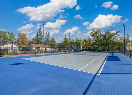 Community Sports court that is a tennis court and half court basket ball at Rocklin Manor  Apartments, California, 95677