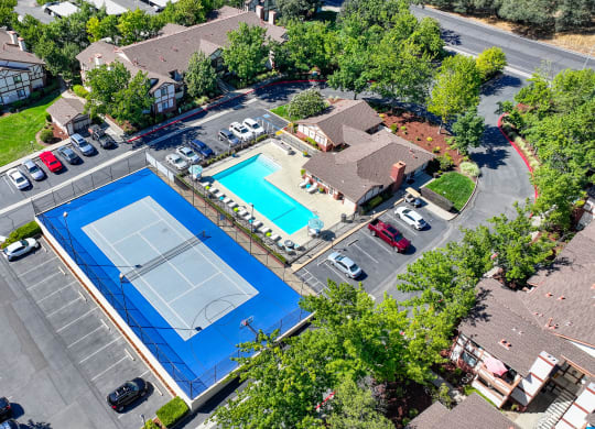 Drone shot of the Rocklin Manor sports court and the swimming pool at Rocklin Manor  Apartments, California