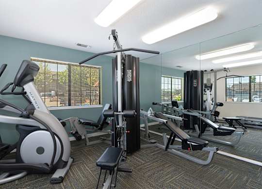 A Gym with a Bench at Rocklin Manor Apartments, Rocklin