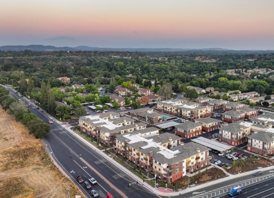 an aerial view of Sierra Gateway Apartment complex at dusk way