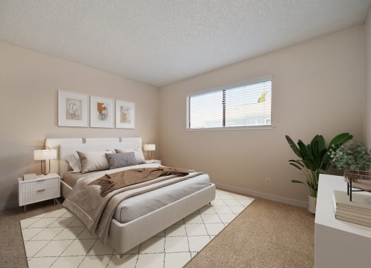 a bedroom with a bed and a window at Silverstone Apartments, California