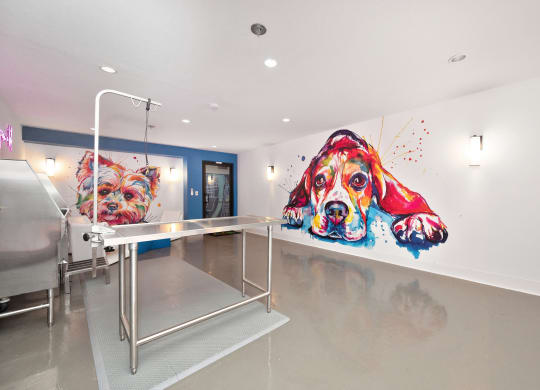 a hospital room with two large paintings of dogs on the wall  at Track 281 Apartments, Sacramento, CA, 95811