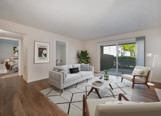 A Living Room with White Furniture at Rush River Apartments, Sacramento