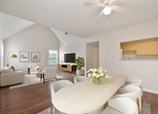 a living room with a dining room table and chairs at Vineyard Terrace Apartments, Napa, 94558