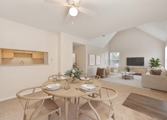 a dining room with a table and chairs at Vineyard Terrace Apartments, California, 94558