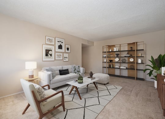 an open living room with a couch and a table