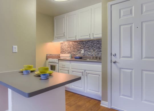 Gourmet Kitchen with Breakfast Bar and Pantry at Twenty 2 Eleven Apartment Homes, Canoga Park, 91306