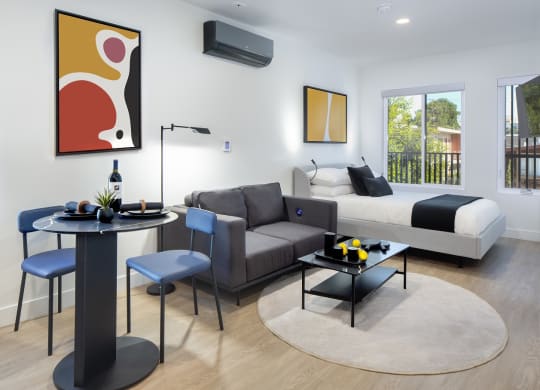 West-LA-apartments-NMS-Olive-Unit-1-Suite-C-Bed-And-Living-Area