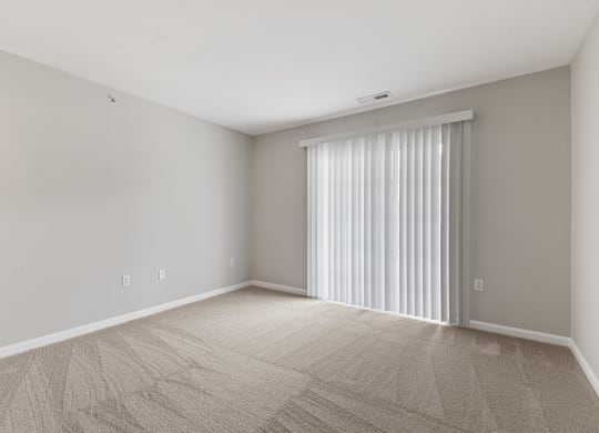 Primary Bedroom with Balcony at Aspen Lakes Apartments, Indianapolis, IN