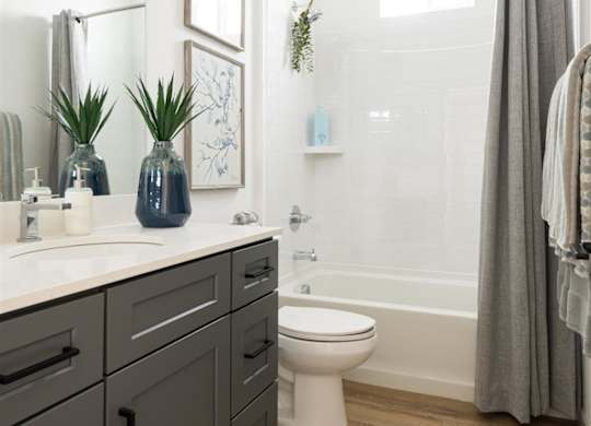 a bathroom with a sink and a toilet and a shower at Villas on Ash, Gilbert, 85234