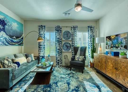 A grassy lounge area near the pool patio at Craft at Gilbert and Baseline Apartments, Mesa, Arizona