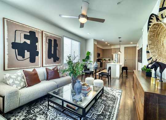 a living room with a couch and a coffee table at Elevation at the Village, Gilbert Arizona