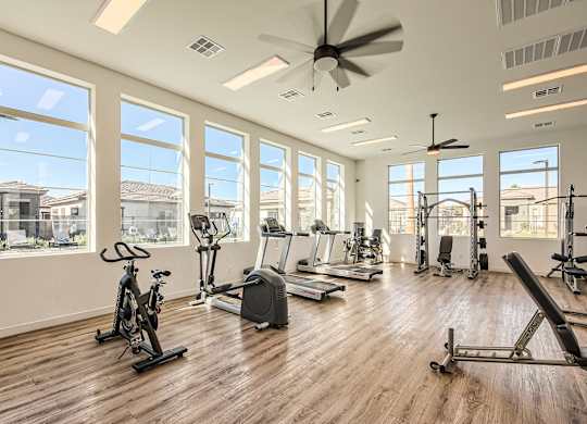 Gym with cardio equipment and a large window at Hampton Meridian, Apache Junction
